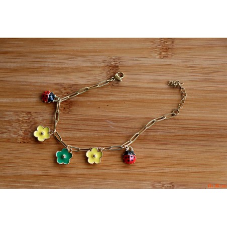 Bracelet de breloques fleurs multicolores et coccinelles