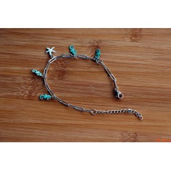 Bracelet de breloques hippocampes et étoile de mer verts