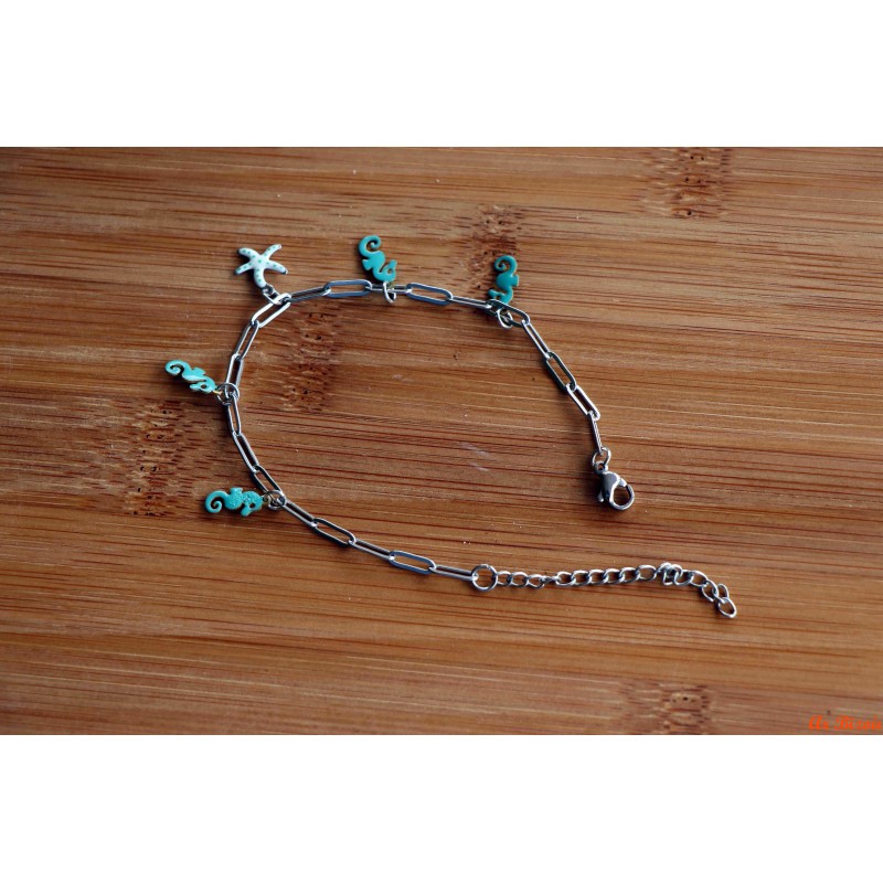 Bracelet de breloques hippocampes et étoile de mer verts
