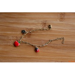 Bracelet de breloques fleur, coccinelle, pomme