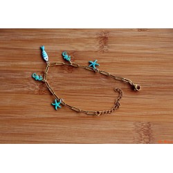 Bracelet de breloques hippocampes et étoile de mer turquoises