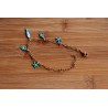 Bracelet de breloques hippocampes et étoile de mer turquoises